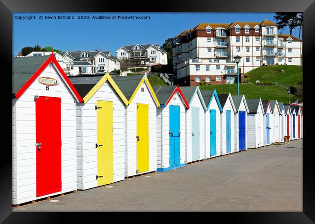 colourful beach huts Framed Print by Kevin Britland
