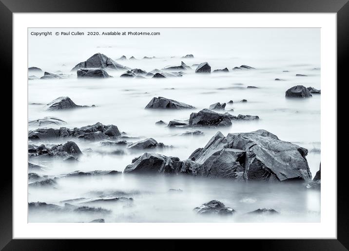 Rocks Uncovered at Lindisfarne. Framed Mounted Print by Paul Cullen