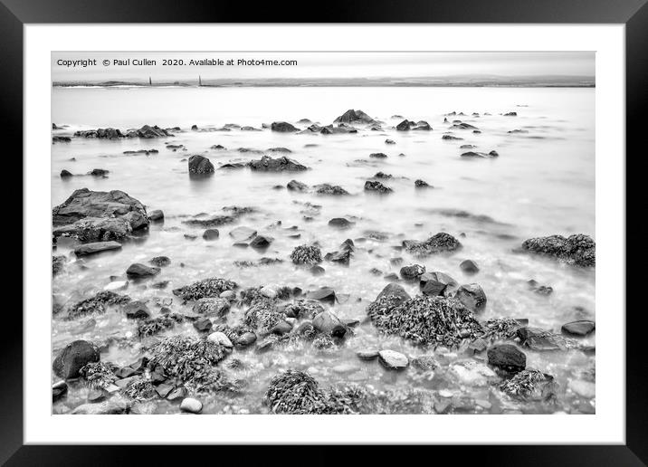 Rocks and Seaweed Uncovered at Lindisfarne - Mono Framed Mounted Print by Paul Cullen