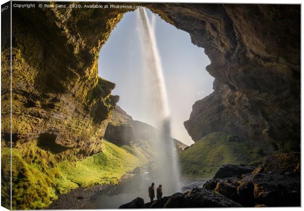 Kvernufoss Waterfall as seen from behind, Iceland Canvas Print by Pere Sanz