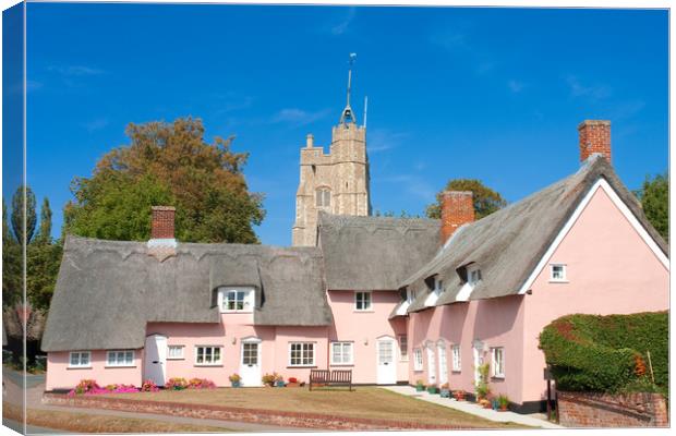 The pink cottages, in front of St Mary's Church, C Canvas Print by Andrew Sharpe