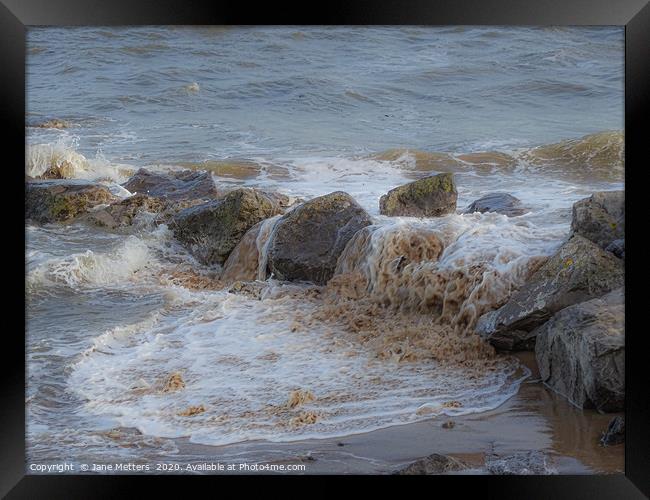 Waves Splashing over the Rocks Framed Print by Jane Metters