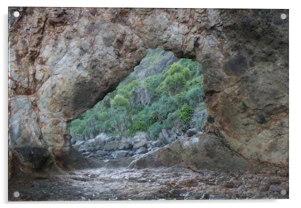 Frame view through a hole in a rock at a coast Acrylic by Hanif Setiawan
