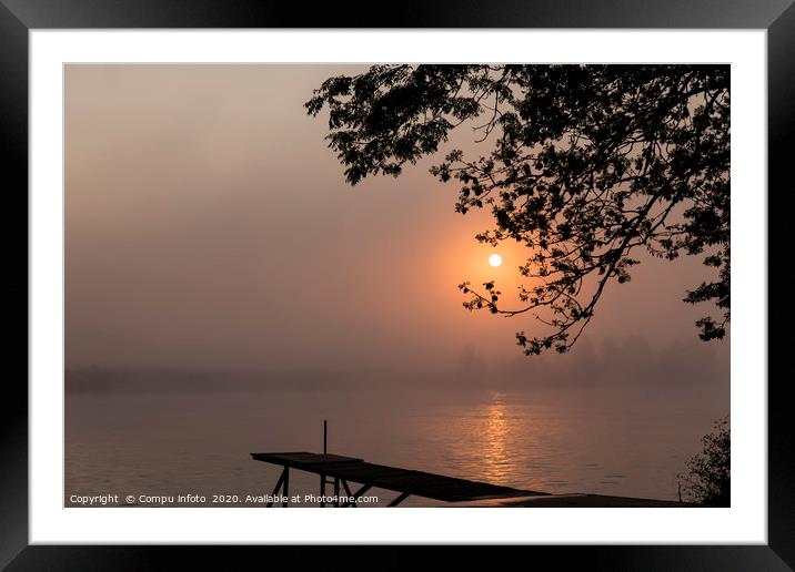 wooden jetty sunrise over the river maas in Hollan Framed Mounted Print by Chris Willemsen