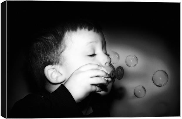 The Boy Who Blew Bubbles Black and White Canvas Print by Simon Gladwin