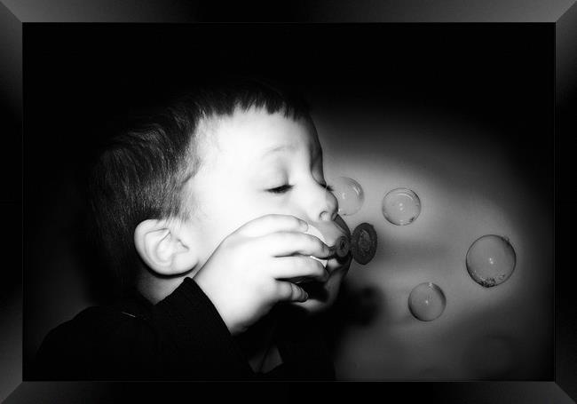 The Boy Who Blew Bubbles Black and White Framed Print by Simon Gladwin
