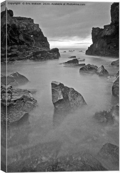 Misty Rocks Canvas Print by Eric Watson