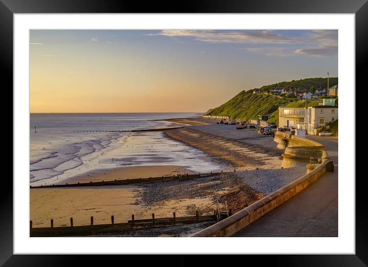 A view over the promenade and beach in Cromer Framed Mounted Print by Chris Yaxley