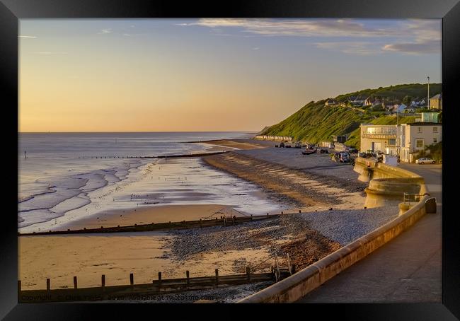 A view over the promenade and beach in Cromer Framed Print by Chris Yaxley