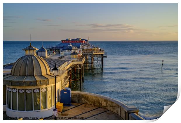 View over Cromer Pier at sunrise Print by Chris Yaxley