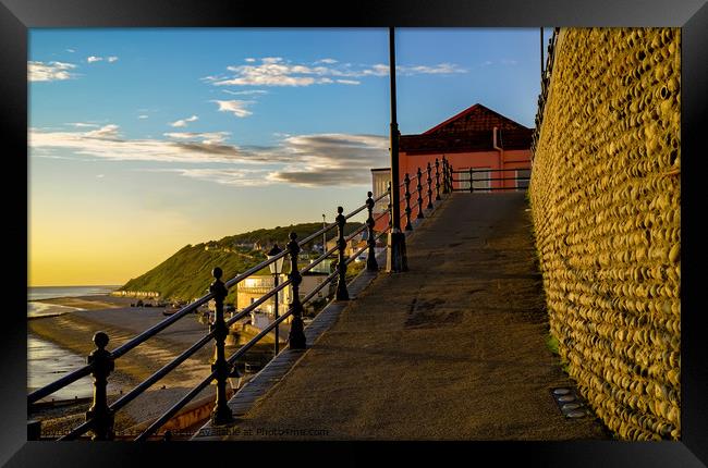Walking the ramp on Cromer seafront Framed Print by Chris Yaxley