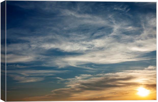 Dramatic clouds in sunset light Canvas Print by Arpad Radoczy
