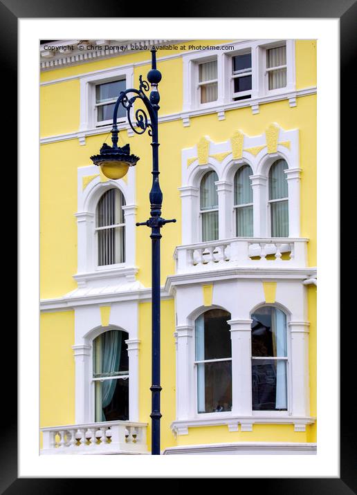 Vintage Lamp Post and Colourful Building in Llandu Framed Mounted Print by Chris Dorney