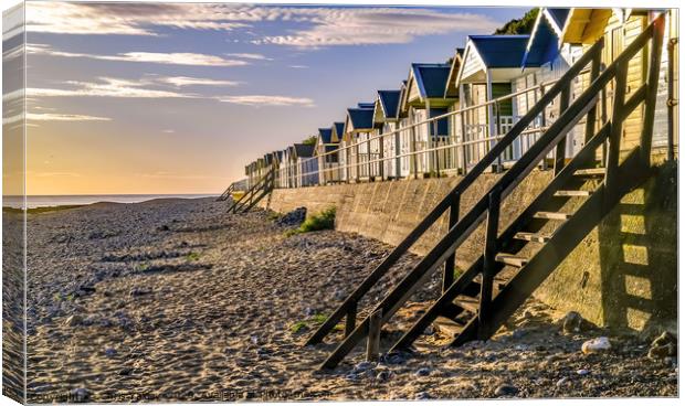 Cromer beach huts at sunrise Canvas Print by Chris Yaxley
