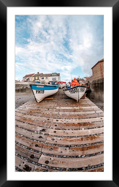 Fisheye view of fishing boats on a wooden slipway  Framed Mounted Print by Chris Yaxley
