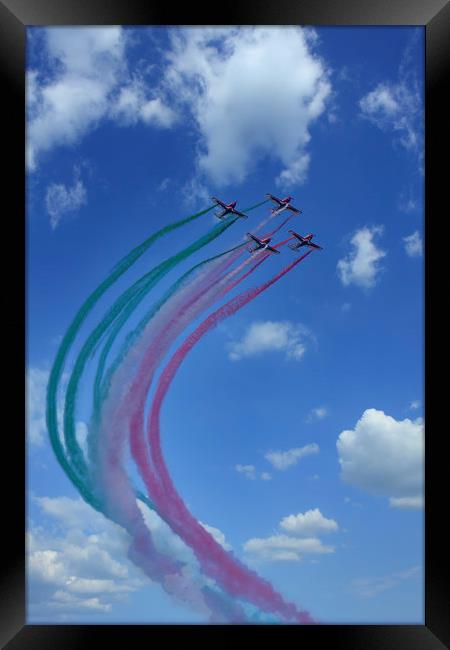 Flying demonstration with colored smoke Framed Print by Arpad Radoczy