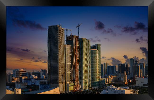 Hotels and New Towers at Sunset Framed Print by Darryl Brooks