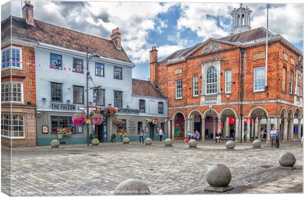 The historic Guildhall and the Falcon pub  Canvas Print by Kevin Hellon