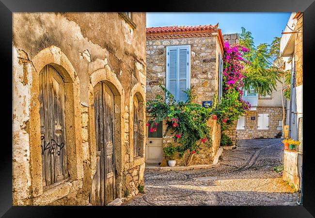 Cobbled street in Alacati Framed Print by Kevin Hellon
