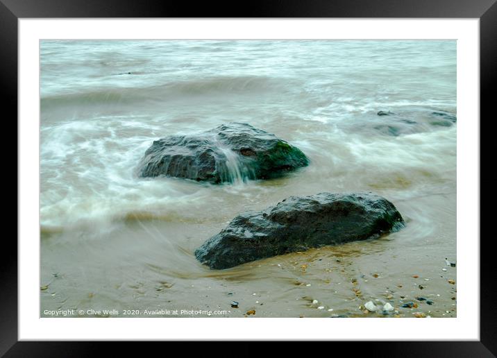 Incoming tide on the rocks at Old Hunstanton Framed Mounted Print by Clive Wells