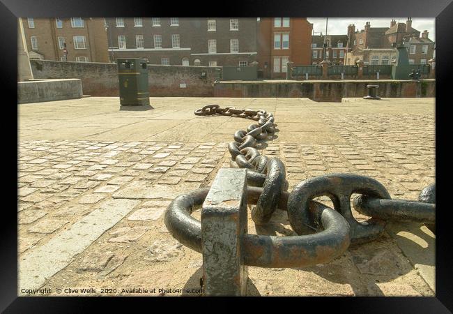 Chains on the old docks at Kings Lynn in Norfolk Framed Print by Clive Wells