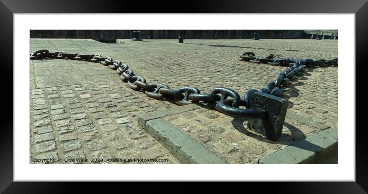 Chained to the walkway at King`s Lynn in Norfolk Framed Mounted Print by Clive Wells