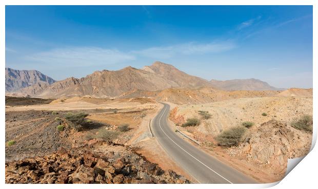 A road going thru the deserted mountains of Oman Print by David GABIS