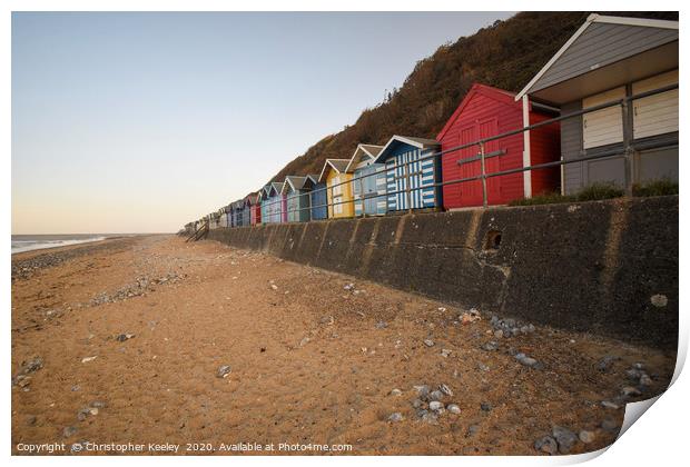 Cromer beach huts Print by Christopher Keeley
