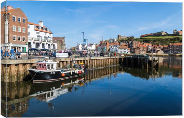 Fishing boat in Whitby harbour Canvas Print by Jason Wells