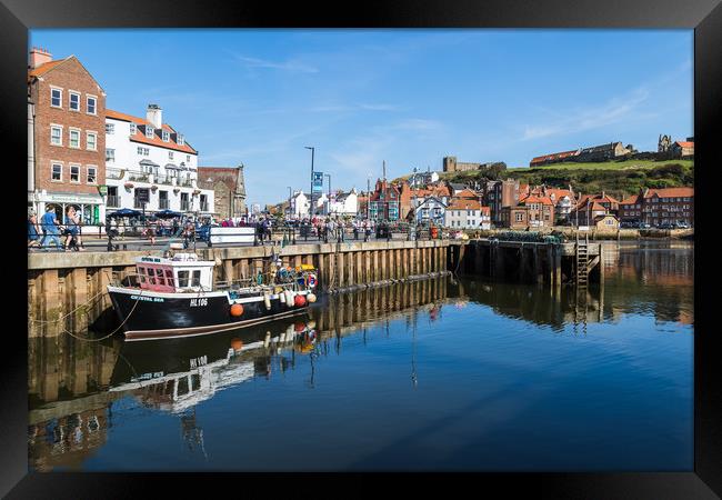 Fishing boat in Whitby harbour Framed Print by Jason Wells