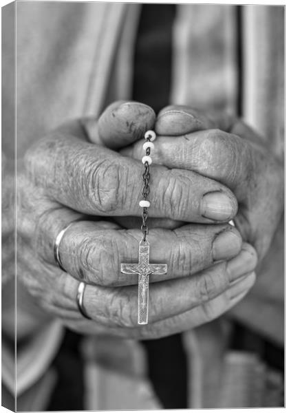 Elderly lady s hands holding a rosary, black and w Canvas Print by Arpad Radoczy
