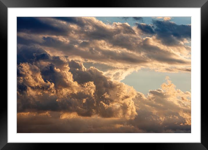 Colorful cloudy sky at sunset. Framed Mounted Print by Arpad Radoczy