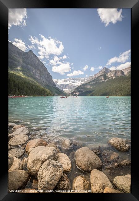 Kayakers on Lake Louise Framed Print by Pete Evans