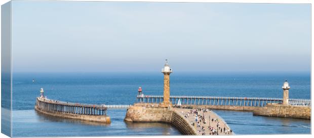 Tourists on the West pier of Whitby harbour Canvas Print by Jason Wells