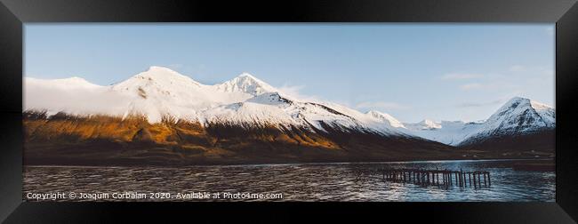 Beautiful scene of a landscape with high snowy mou Framed Print by Joaquin Corbalan