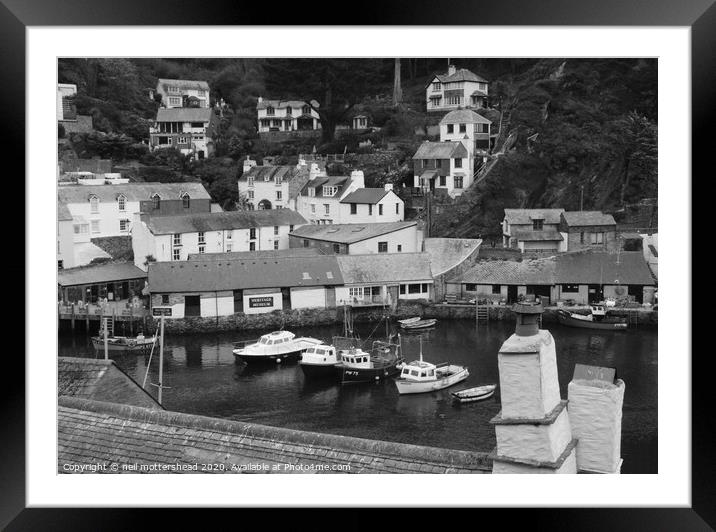 Fishing boats shelter in Polperro Harbour Framed Mounted Print by Neil Mottershead