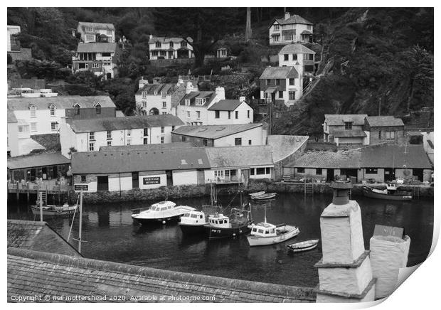 Fishing boats shelter in Polperro Harbour Print by Neil Mottershead