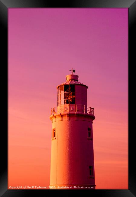 Lighthouse at sunset Framed Print by Geoff Tydeman