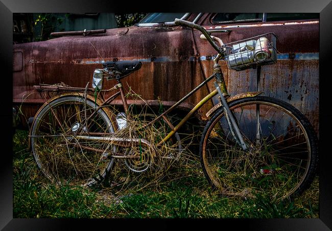 Old Bike with Coke Cans Framed Print by Darryl Brooks