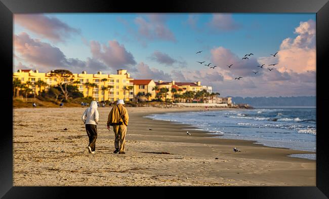 Old Couple Walking up Empty  Beach Framed Print by Darryl Brooks