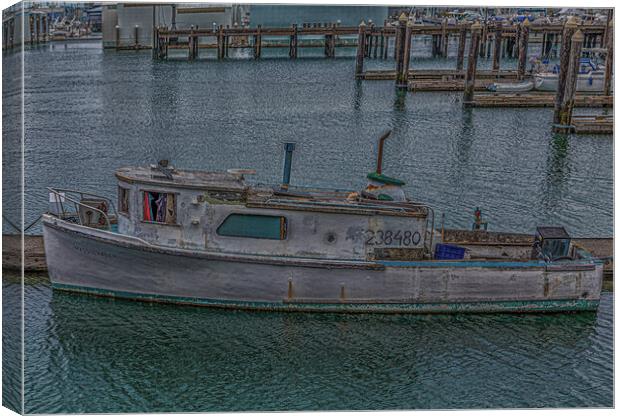 Old Fishing Boat Tied to Pier Canvas Print by Darryl Brooks