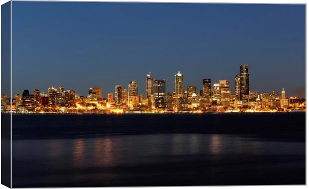 Skyline of Seattle Washington during night time  Canvas Print by Thomas Baker