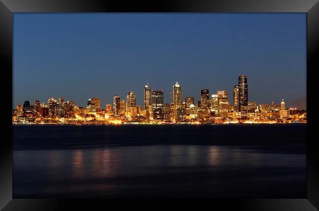 Skyline of Seattle Washington during night time  Framed Print by Thomas Baker