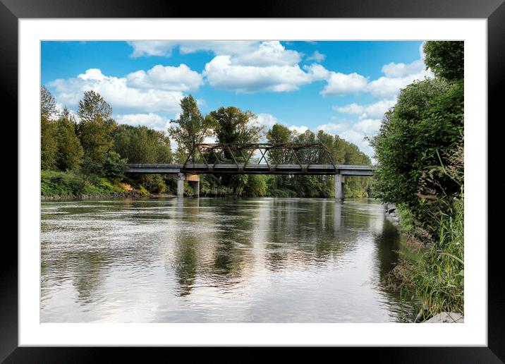 Railroad bridge over large flooded river  Framed Mounted Print by Thomas Baker