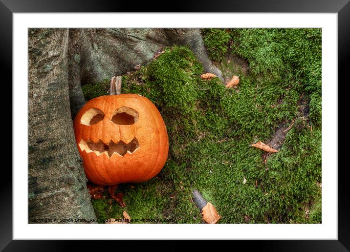 Scary halloween pumpkin in the woods Framed Mounted Print by Simon Bratt LRPS