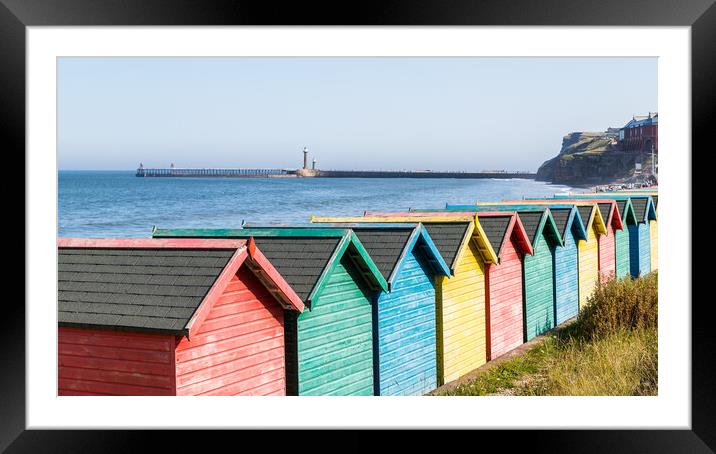 Fading beach huts at Whitby Framed Mounted Print by Jason Wells