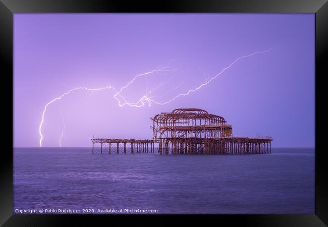 Brighton West Pier Lightning Framed Print by Pablo Rodriguez
