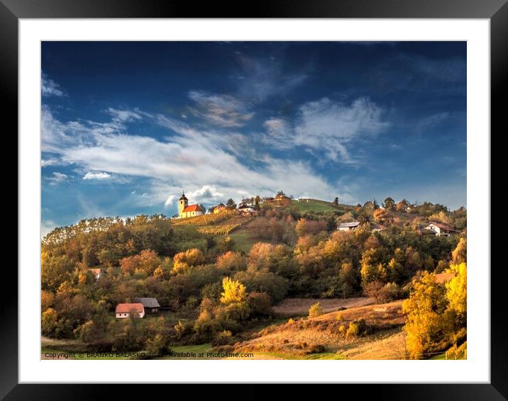A group of clouds in the sky Framed Mounted Print by BRANKO BALAŠKO
