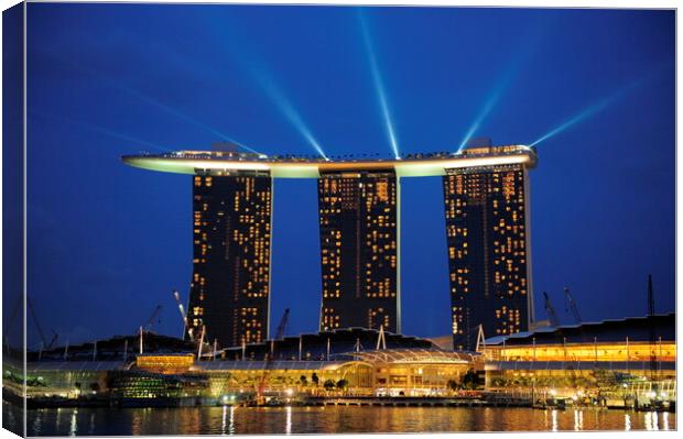 A lit up city at night with Marina Bay Sands Singapore in the background Canvas Print by Alessandro Della Torre