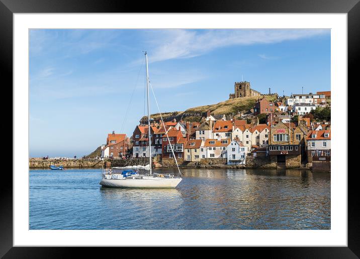 Yacht enters Whitby harbour Framed Mounted Print by Jason Wells